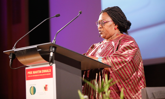 Asmaou Diallo giving a speech at the Martin Ennals Award Ceremony in Geneva, Switzerland. She was a finalist for the 2015 prize.