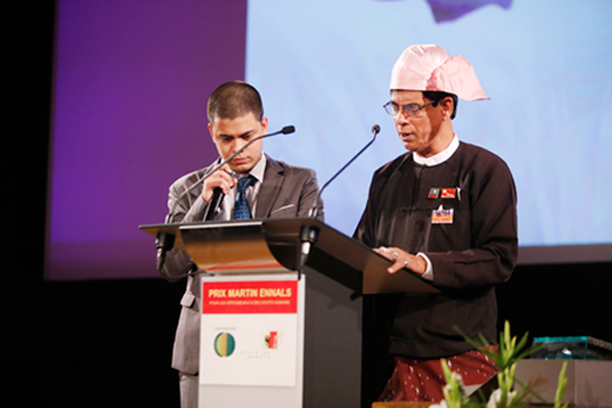 Robert Sann Aung and his son giving a speech at the 2015 Martin Ennals Award.